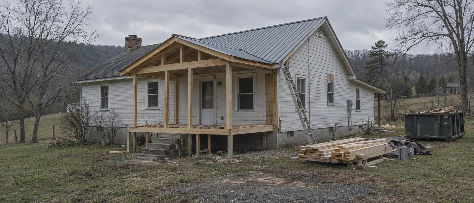 A farmhouse mid-renovation with a new porch frame